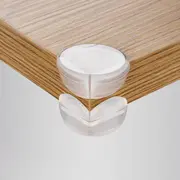 Set 4 protectii universale pentru colturi, din plastic transparent, cu banda adeziva, rezistente la muscaturi, fara PVC, Reer 82049