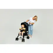 Carucior sport compact, Lionelo, Irma, Spatar reglabil in 4 pozitii, Suport picioare reglabil, Manere rotative, Pliere tip umbrela, 6- 36 luni, Pana la 15 kg, Conform cu EN1888-1:2018, Gri/Negru BYNLO-IRMA_BLACK/DARKGREY