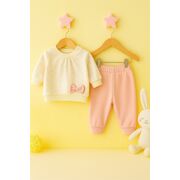 Set bebelusi cu bluzita ivoire cu fundita si pantaloni roz trmdy1021