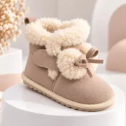 Cizme bej imblanite pentru fete superbebe shop din piele ecologica cu talpa de cauciuc si ciucurei pufosi, peste glezna, inchidere cu fermoar