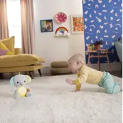 Bright starts - jucarie interactiva hug a bye baby elephant bbb12498