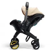 Scoica auto Doona i i-Size Sahara Sand 2 in 1 ERFSP350-20-043-041