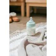 Biberon 150 ml cu tetină rotundă din silicon, debit lent, iepuraș gri Hygge Suavinex JEM8426420069021