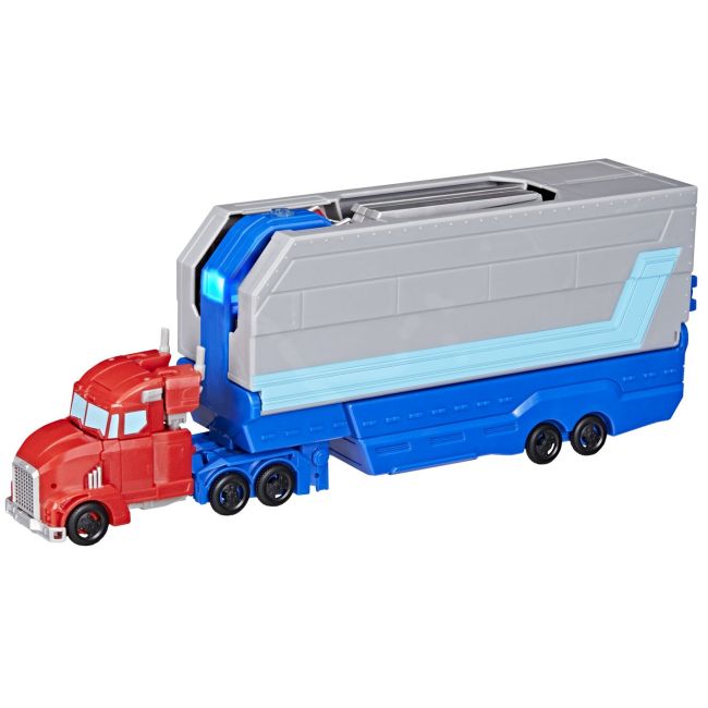 TRANSFORMERS EARTHSPARK CAMION CU REMORCA DE LUPTA OPTIMUS PRIME VIVG0750