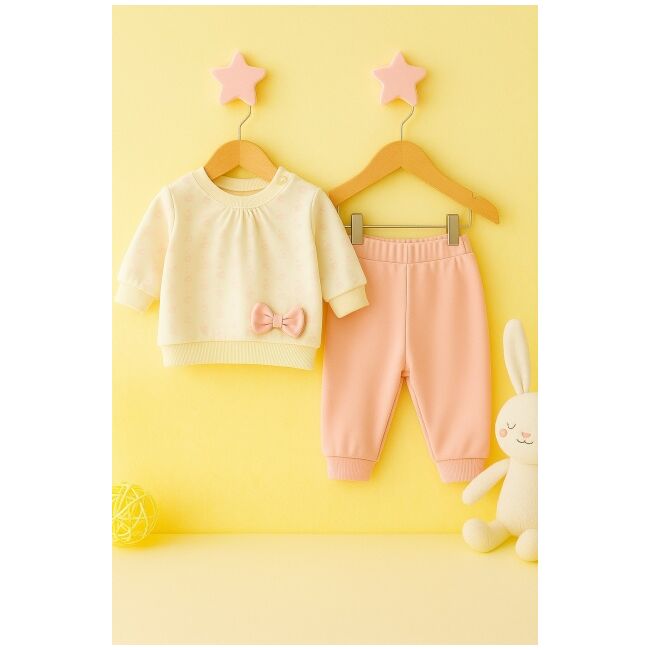 Set bebelusi cu bluzita ivoire cu fundita si pantaloni roz trmdy1021