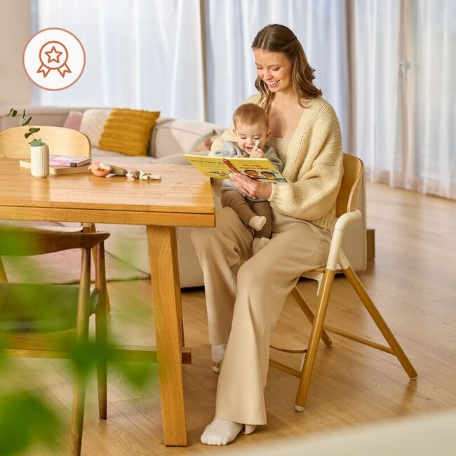 Scaun de masa multifunctional Celia, Lionelo, Din lemn de fag, 6 luni- adult, Reglabil pe inaltime, Spatar lat, Sezut ergonomic, Tavita silicon, Suport de picioare reglabil, Greutate maxima 90 Kg, Alb/Natural BYNLO-CELIA_WHITE_NATURAL_WOOD