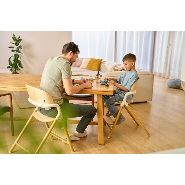 Scaun de masa multifunctional Celia, Lionelo, Din lemn de fag, 6 luni- adult, Reglabil pe inaltime, Spatar lat, Sezut ergonomic, Tavita silicon, Suport de picioare reglabil, Greutate maxima 90 Kg, Gri BYNLO-CELIA_GREY_WOOD