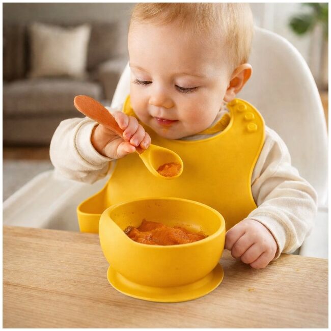 Set din silicon cu bol bavetica si lingurita pentru bebe - galben mustar addta59-8
