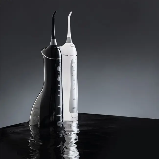 Irigator oral  dus bucal Vitammy Hydra, profesional, 3 moduri de functionare, rezistent la apa, 2 duze, Alb BITVitammyHydraalb