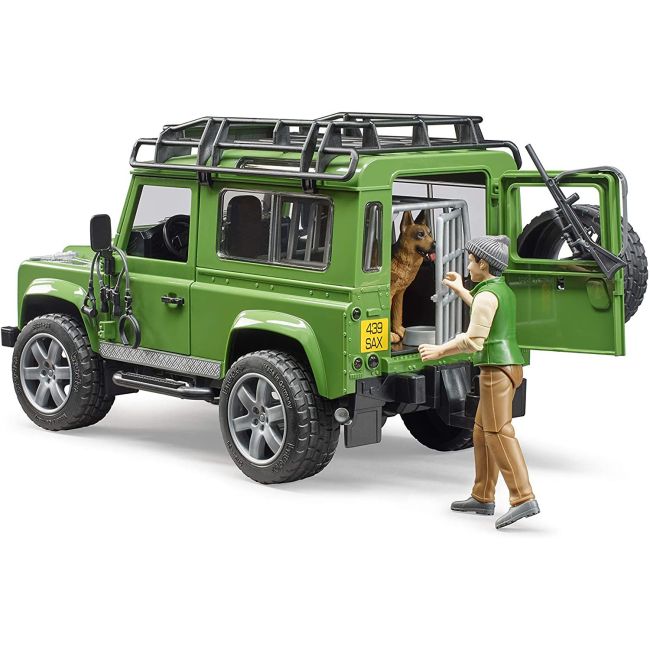 BRUDER - MASINA DE TEREN LAND ROVER DEFENDER CU PADURAR SI CAINE ARTBR02587