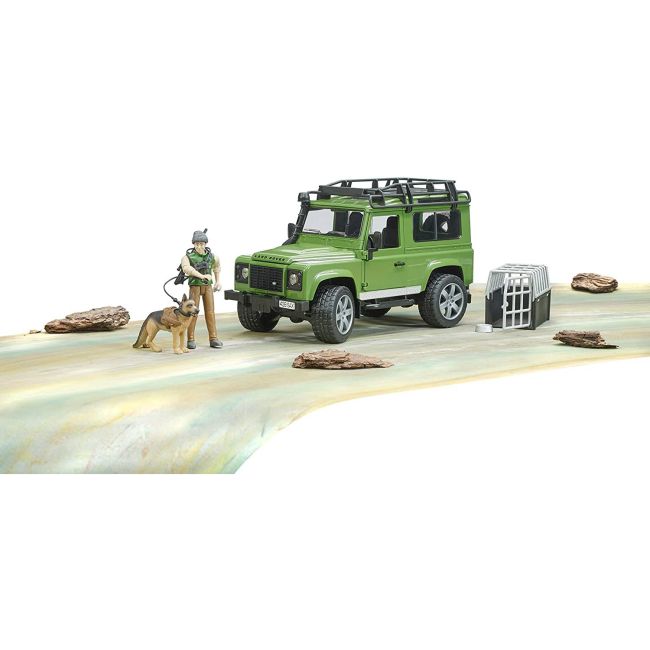 BRUDER - MASINA DE TEREN LAND ROVER DEFENDER CU PADURAR SI CAINE ARTBR02587