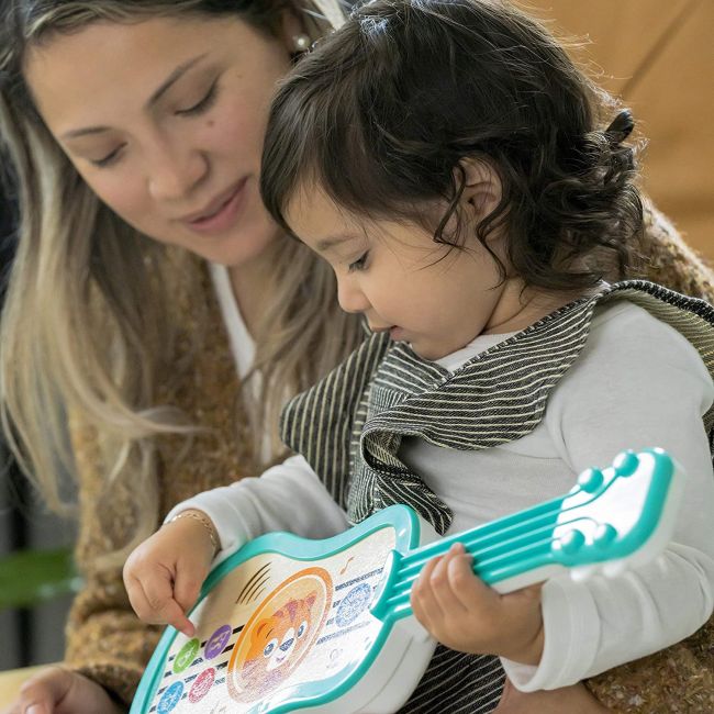 Baby Einstein - Jucarie muzicala Ukulele fermecat BBB12609