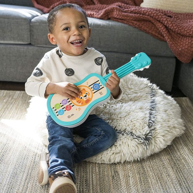 Baby Einstein - Jucarie muzicala Ukulele fermecat BBB12609