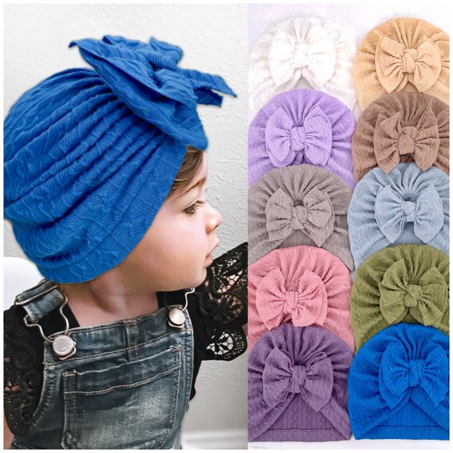 Caciulita tip turban cu model din tesatura si funda aplicata AMx-22032