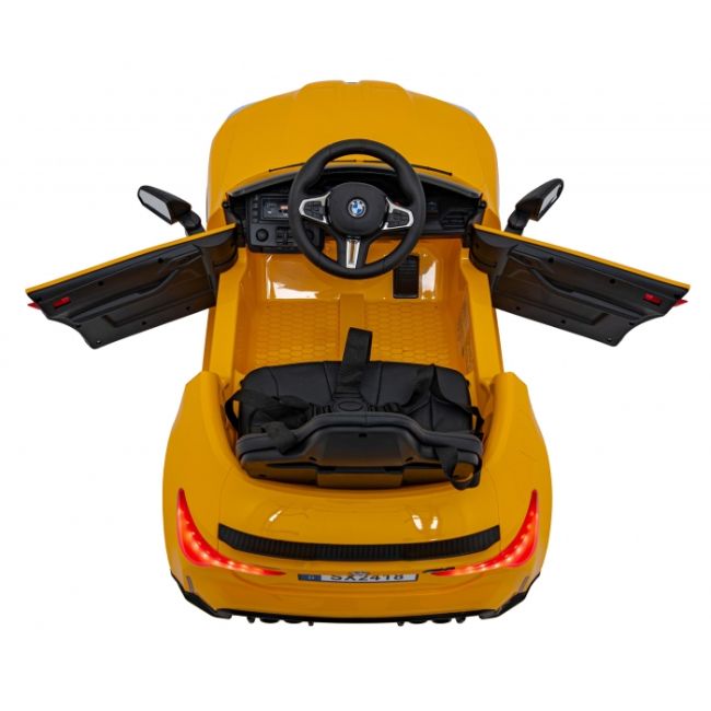 Masinuta electrica cu telecomanda bmw m4, roti eva, scaun tapitat, 112x71x46 cm, putere 70w - galben edeedipa.sx2418.zol